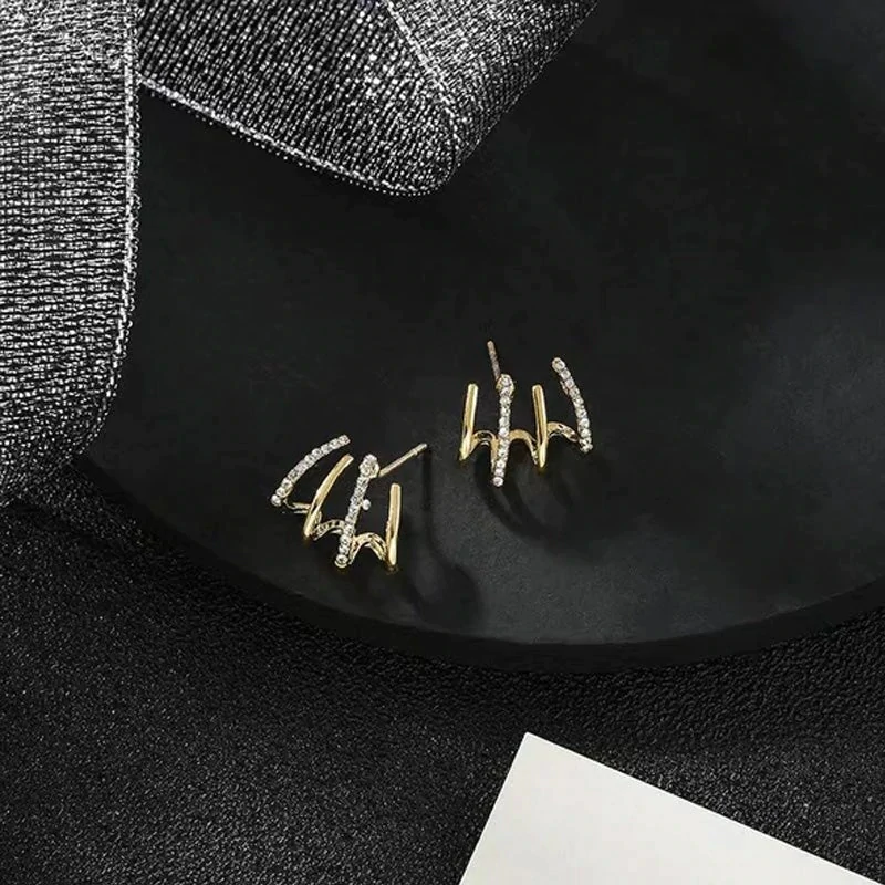 DenHavn | Four-prong Earrings®